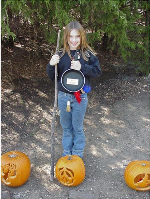 Morgan Carter with pumkins & cooking trophy.JPG